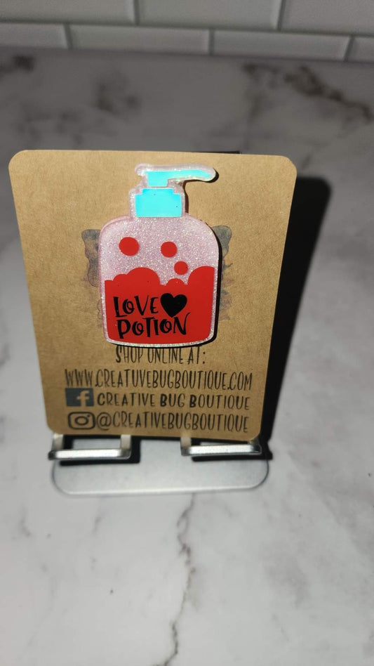 Love Potion Bottle Badge Reel