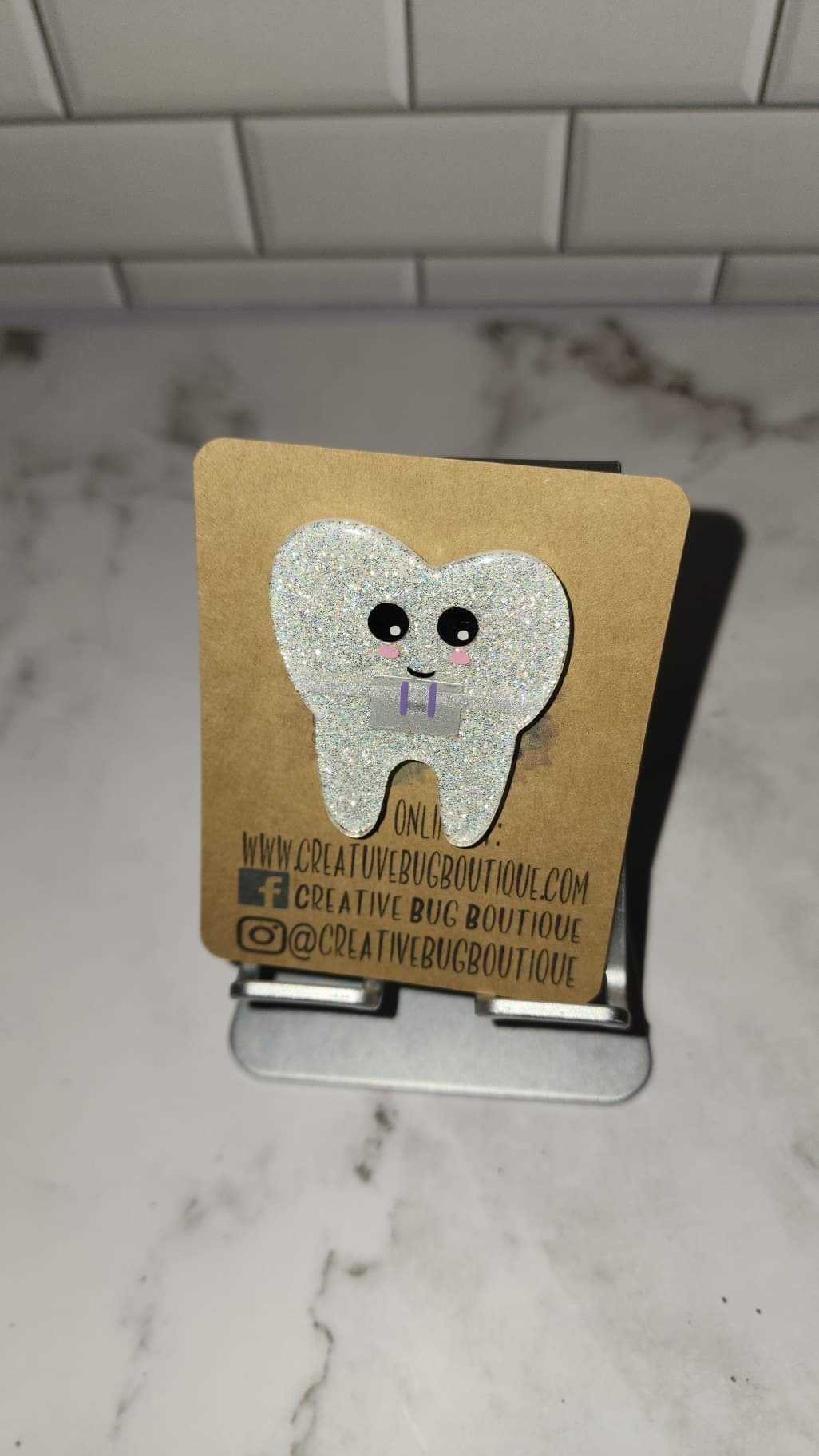 Tooth Badge Reel